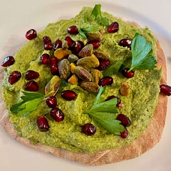 This was as good as it looked! I love the unique flavor- so good on hot pita. Pomegranate seeds are a must!