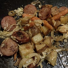 I used the sauce part of this recipe for a cabbage, potato and kielbasa skillet. 
I used diced red potatoes, fingerling carrots, sliced sweet onion, garlic and angel hair bag of coleslaw with sausage coins. Topped with some green onions.
Very tasty.