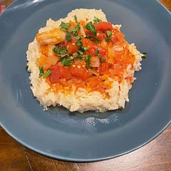 Didn’t have white wine on hand so used chicken broth and lemon juice instead. Put on a bed of cheesy Parmesan rice.
