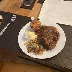I cooked in in the slow cooker for around eight hours and thickened it will a little arrowroot around the seven hour mark. I Served it with cabbage , mashed potatoes and Yorkshire puddings and it was a great success.