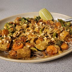 I doubled the recipe, tripled the spices and cut back a bit on the PB. Served over soba noodles (that's all i had). One of my favorite new meals to make. 