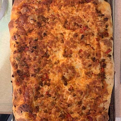 Left in the fridge for 48 hours. Added sausage, peppers and onions. Light base of tomato sauce