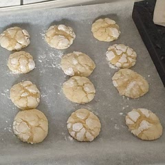 Yummy crinkle cookies! Lemony flavour, crispy on the outside and soft inside. 
Note to self: keep the dough consistently cold, I found that the cookies that were kept outside the fridge the longest dissolved the most sugar and hence lost the white cracked pattern.