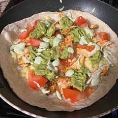 I decided to use pre-grilled chicken and added the spices in while heating it up to cut down cook time. I also added in guac. One of my go-to easy weeknight meals.