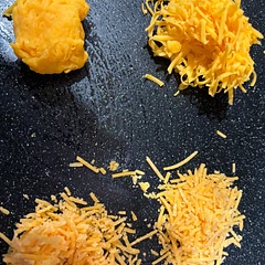 Use freshly shredded block cheese.   Using pre shredded will cause it to be dry due to starch placed in product to prevent clumping.  See pic below. Top 2 are freshly shredded block cheddar and 2 below are pre- shredded    Left side after “squishing”. 

Use your favorite sausage, mine is Jimmy Dean with sage.   Mixed with my Kitchenaid stand mixer.   Came out perfect. 

Served with warm pineapple sauce containing brown sugar and mustard.
