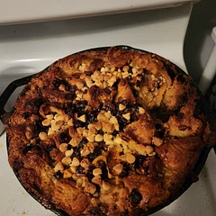 Added roasted pecans. Cranberries instead of raisins and white chocolate chips. Usually dont use a recipe for btead pudding but will add this one to my rep.