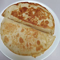 Instead of placing the tortilla on top of the egg i instead placed the tortilla down and put the cheese and egg on top, letting the cheese melt inside the tortilla.
