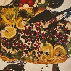 Put less sauce on and in the center with salmon still showing; put full parsley leaves as garnish on top 