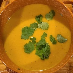 Used more coconut milk (13.5 oz can) and less broth (~2 cups). Also subbed caramelized onions for raw. Absolutely delicious. Will make again. Right balance of spice and sweet and creamy. 