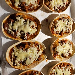 Couldn't access instructions so had to wing it. Fried off sausage, chorizo and onion. Then added all diced veg and cooked through. Added spices and cooked for a minute then chopped tomatoes and let simmer. Into boats with cheese. I added some hot chilli powder to spice mix. Very tasty. 