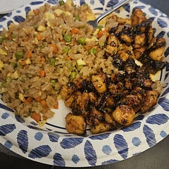 A Lil over cook causeni had it sitting in the pan idk why ...but the flavor it's wow 👌 and the rice is a recipe from here too look for it 