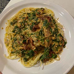* Seasoned the sauce with pepper flakes, Italian seasoning, and pepper. Added a tad more cream & broth. 
* Seasoned the chicken heavily rather than lightly. 
*  Frozen spinach 
* Added more Cream & Broth into the pot when everything was added to go above the chicken. 
* Used full 8oz jar of Sun Dried Tomatoes & tried to drain them a bit before adding. 
* Served on Spaghetti Noodles