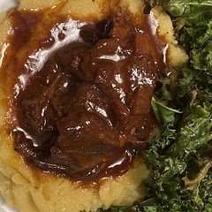 Took lamb off the bone and added it to the sauce. Served with polenta and kale.