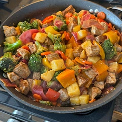Added carrots and some extra seasoning on pork.  Served on white rice. Quick and easy to do!

Little bit sweet so something spicy might be good to offset that