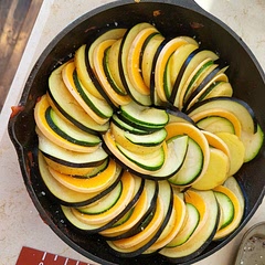 Cut recipe down to a side dish size for four people. I omitted the tomato slices and subbed in golden potato slices and served atop creamy polenta. 