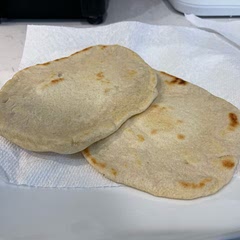 I like them thick so I flattened in a tortilla press and stretched by hand but not too much. Delicious!