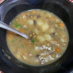 Made a roux at the beginning to thicken it up, omitted the tomato and tamari, and added rosemary and thyme. Delicious, served with a roll.