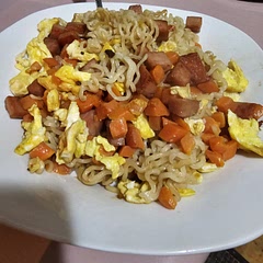I kinda just used this as inspiration. I used only 1 egg, added maybe 1/4 cup of carrots, and diced spam. Cooked the noodles, fried the spam in a pan, cooked scrambled eggs in the same pan with a splash of sesame oil. In the last minute, i added the noodles and combined everything as best i could.