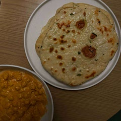 It was good. Next time maybe I’ll simmer the beans longer — I made the naan from scratch