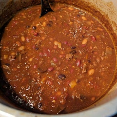 I added my own take on the recipe. I added curry, extra beans, didn't drain some of them, mushrooms, yellow bell pepper, 2 lbs of beef, extra broth and some corn starch slurry to thicken a bit.  Everyone enjoyed this! 