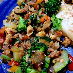 Spend the time chopping with this one! Delicious! Started off with onions and carrots (diced small) added zucchini, broccoli,  celery, and red peppers. Stayed with brown rice and followed the rest of the recipe to a tee. Flavor galore!