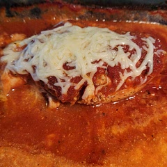 I added Minced garlic to the oil and seasoning step, added Minced garlic to the cheese mixture, we thing it needs parmesan added. Served with rotini, very filling and happy making.