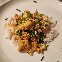 This was pretty good. I used 1/4 cup of soy based on reviews. I might actually add more next time. I didn't have scallions, so I used chives. I also used one large cauliflower - worked out to 6 cups anyways. 