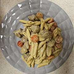 Quick delicious one-pot recipe. Used 1lbs of spicy Italian sausage instead of chicken, and cherry tomatos instead of the sun dried tomatoes