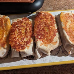 I started off with eight burritos and ended with none between two people.
I added some black beans and next time recommend a creamy jalapeno sauce to give it a bite.
I ended up putting them on my griddle, and oh my goodness, it worked so good!