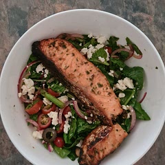 Allowed the salmon to marinate for a short while before baking/broiling. Used spinach in place of the spring mix, cutting it up loosely. Sliced the olives, using 6 black olives. So delicious!!