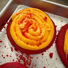Changed the color up for the Super Bowl. Used 2 oz red food coloring for the cookies and about 10 drops of yellow for the frosting.