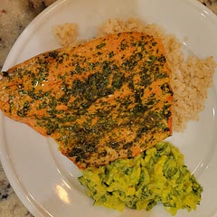 Put cilantro in the rub as well. I did like the combination of spices. Sockeye salmon on a bed of brown rice. Could've used a little less onion and we added two whole limes for extra acid in the avocado salsa. Maybe we'll add some mango next time...