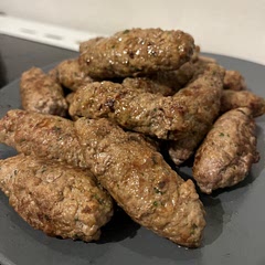 This thing is the real deal. Didn't have ajvar, but if you fry bread in the leftover oil, it almost makes it seem like it's that bun that they serve cevapcici with. 