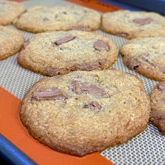 I replaced the egg with Activia yogurt & they tasted great! I also used only 1/3 cup granulated sugar, next time I'll use only 1/4 cup because they were a bit too sweet. I'd also use less butter because they flattened out too much.