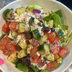 Served on a bed of mixed greens with pearl cous cous. So good!