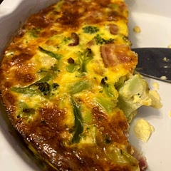 We used 10oz of frozen broccoli bits, chopped it up extra for easy serving, 5 slices of ready cook bacon chopped, & added 2 more eggs.  
2 recipes fed our meal of 7 well.
