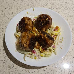 Used walnuts not pecans. Such fantastic flavours that mix so well together: delicious slaw and delicious meatballs. So delicious!! 1 serving made 4 meatballs.