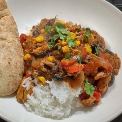 Added 3 bell peppers with the onion, and I was liberal with seasoning. Slow cooked it 4 hours on high, then added the beans and sweetcorn and simmered for another hour. Served it on rice with a pitta on the side. Absolutely devine!!
