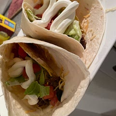 We like to do soft shell, queso, hard shell, then toppings. 
Ours were ground beef, cheese, lettuce, pico, avocado, sour cream