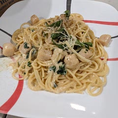 Delicious and easy recipe. Tastes like something you'd find in a restaurant. Also really good with shrimp. I usually add a bunch of Parmesan to melt in the sauce at the end as well as in the topping