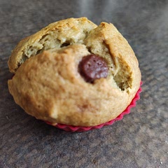 I used 4 bananas and a single size container of unsweetened applesauce. I also substituted oil for the melted butter and added a handful of chocolate chips and a handful of toasted sliced almonds. Very moist and delicious!