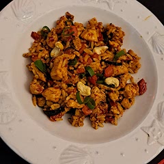 We went ahead and mixed the rice into the rest of the food and substituted celery for baby marrow. No regrets. Use raw cashews and don't be afraid to add more red pepper. 