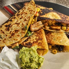 This is a really good and easy recipe. I added red bell pepper to the mix as well as some leftover over chicken. Topped it with guacamole and sour cream. Had a ton of leftovers!