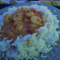 Use extra curry paste. Coconut milk works well enough in lieu of coconut cream also.