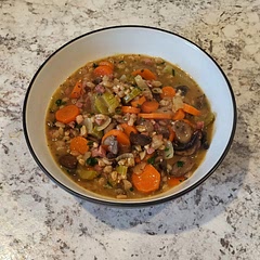 As always made swaps based on what I had. Only needed one onion. Just used sliced baby bellas (8 oz), pre-diced ham, white wine, rosemary instead of thyme. I'm sure this all changed the flavor profile a lot, but it was delish! Mixed in all the parsley. A bowl of comfort!