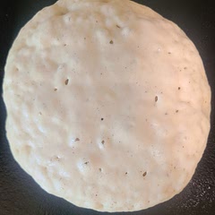 Made with Bob's 1:1 gluten free flour and they weren't bad. Make sure to wait for bubbles to form and stay formed in the middle before you flip. They're not perfect. But they will do. I might add a flax egg next time.