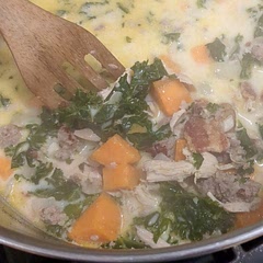Swapped sweet potato for russet potatoes (My kids hate white potatoes). Added some leftover rotisserie chicken and some navy beans.  This is my husband's favorite soup, hoping the kids love it too. Fingers crossed. 