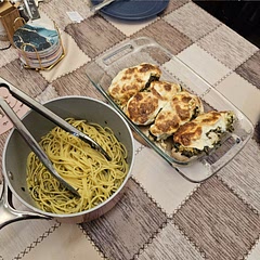 I didn't bother flattening or cutting the breasts. I cooked fairly large breasts for 40 minutes and I was pretty generous with the pesto,tomatoes and cheese. Poured the juices over al dente spaghetti and it made for a pretty dang good meal.