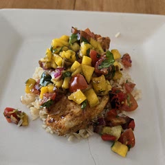 This was tasty! I used mango instead of peaches because the store was out. Also added grilled red onion, yellow and red pepper. Served over a bed of long grain brown rice. Was a nice change of pace to begin the warm weather season. 