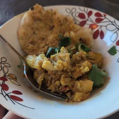 Delicious! Served with garlic naan.